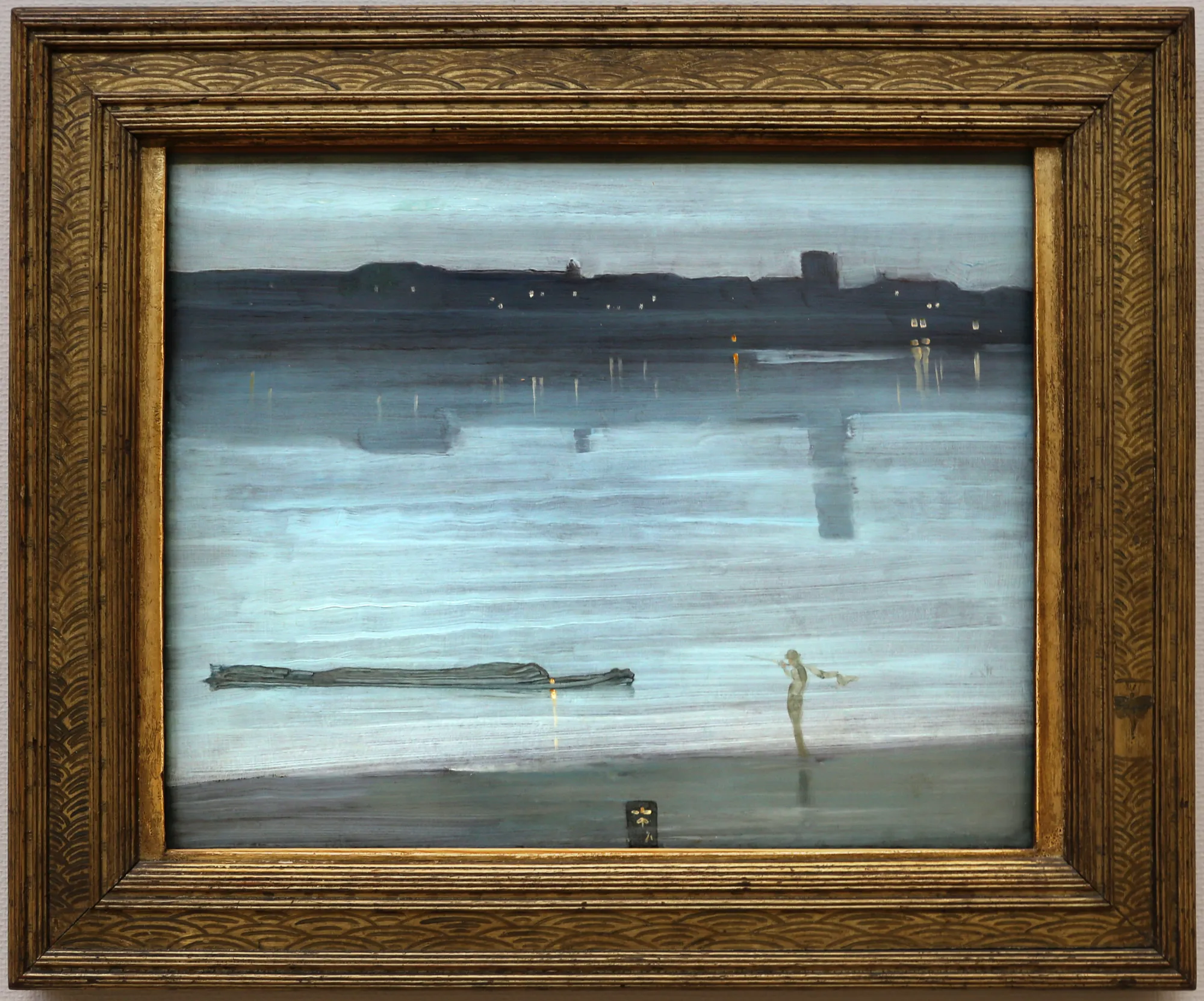 Whistler's nocturne of the Thames at Chelsea: blue-grey river and one faint light on the far shore
